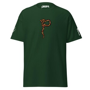 May include: Dark green t-shirt with a brown, red, and yellow snake design. The word "SIGNEA" is printed in white on the neckline. White graphics are on the sleeves. A casual, comfortable tee, perfect for everyday wear.
