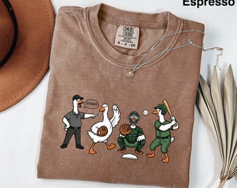 Funny Geese Baseball Shirt, Comfort Colors® Sport Tee, Quirky Bird Lover Gift, Umpire Goose Graphic T-Shirt, Silly Animal Baseball Team