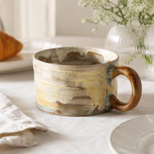 Earthy Glazed Pottery Mug with Brown Handle