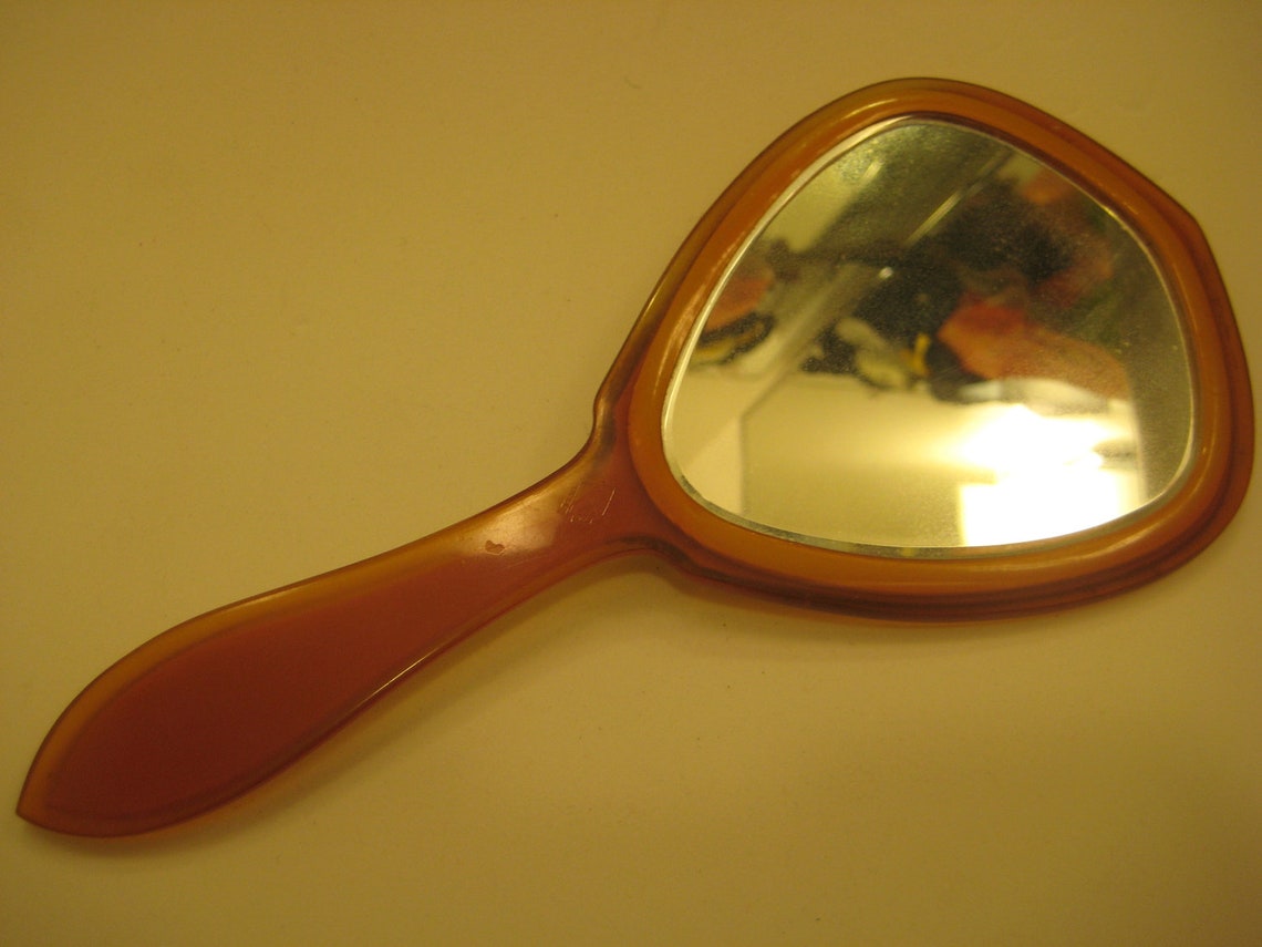 Vintage Bakelite hand held Mirror Etsy