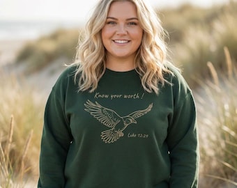 Sudadera de inspiración cristiana con estampado de cuervo en vuelo y la inscripción "Conoce tu valor" / Arte lineal minimalista