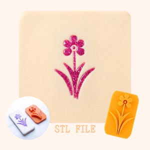 Könnte beinhalten: Ein pinkfarbenes Glitzerblumen-Design auf cremefarbenem Hintergrund. Das Bild zeigt eine Nahaufnahme der Blume sowie zwei Beispiele des Blumendesigns auf einem weißen und orangefarbenen rechteckigen Stempel. Der Text "STL FILE" steht unten.