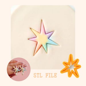 May include: A star-shaped design with a rainbow gradient, possibly a cookie cutter or jewelry component. The image includes a finished earring design with a pearl drop and the text "STL FILE".