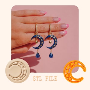 May include: A pair of gold-toned earrings featuring a crescent moon design in dark blue enamel with gold stars. Each earring has a teardrop-shaped blue gem pendant. The image also shows an STL file and a 3D-printed moon shape.