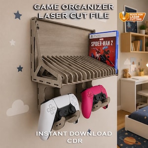 May include: A wall-mounted wooden game organizer laser cut file featuring slots for game cases and two hooks for controllers. The unit holds a Spider-Man 2 game case, a white controller, and a pink controller. Text reads GAME ORGANIZER LASER CUT FILE.