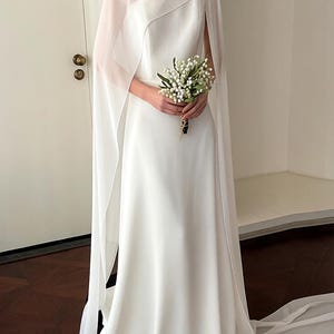 white dress with cape overlay Sleeve and understated sophistication White Cape Dress - Etsy