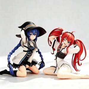 May include: Two anime-style figurines in a kneeling pose. The left figure has long blue braided hair, a black witch hat, and a white and black outfit. The right figure has long red hair in twin tails, a white and black top, and a white skirt.