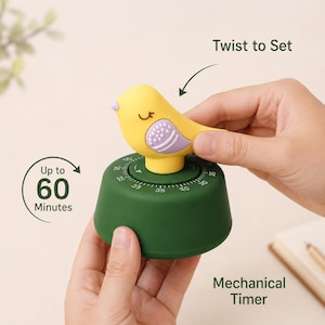 May include: A mechanical timer with a dark green base and a yellow bird topper. The base features white numerical markings for up to 60 minutes. Text on the image includes Twist to Set, Up to 60 Minutes, and Mechanical Timer.