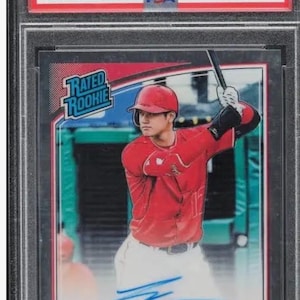 May include: A set of three ceramic mugs with a speckled, matte finish. The mugs are in shades of cream, light gray, and dark gray. Each mug has a simple, minimalist design and a rounded handle. The mugs are suitable for coffee, tea, or other beverages.