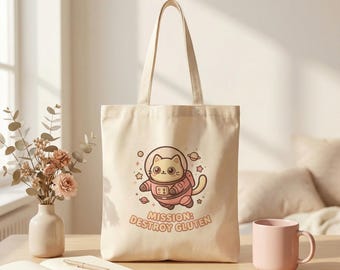 Borsa tote in tela: design con gatto astronauta in missione per distruggere il glutine, ecologica e adatta agli acquirenti.