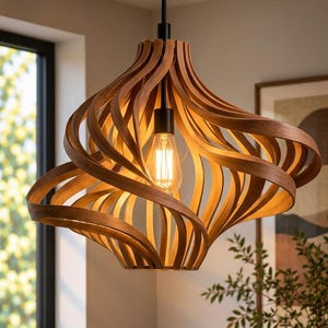 May include: A pendant light fitting featuring a series of curved, light brown wooden slats arranged in a spiralling, open-cage design. The fitting is suspended by a black rod from a circular wooden ceiling mount and contains a single light bulb.