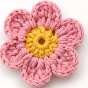 May include: A white ceramic mug with a black handle and the text "But First, Coffee" in a bold, black font. The mug is set against a blurred background. The mug appears to be approximately 10 cm tall.