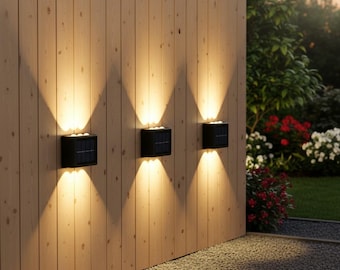 Lámpara de pared solar exterior impermeable con iluminación LED ascendente y descendente para jardín, patio o terraza. Aplique solar moderno para decoración del hogar.