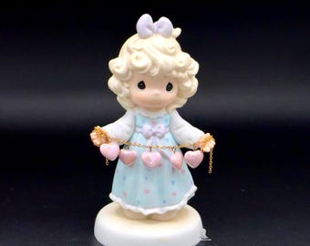 Precious Moments Porcelain Figurine with Heart Garland