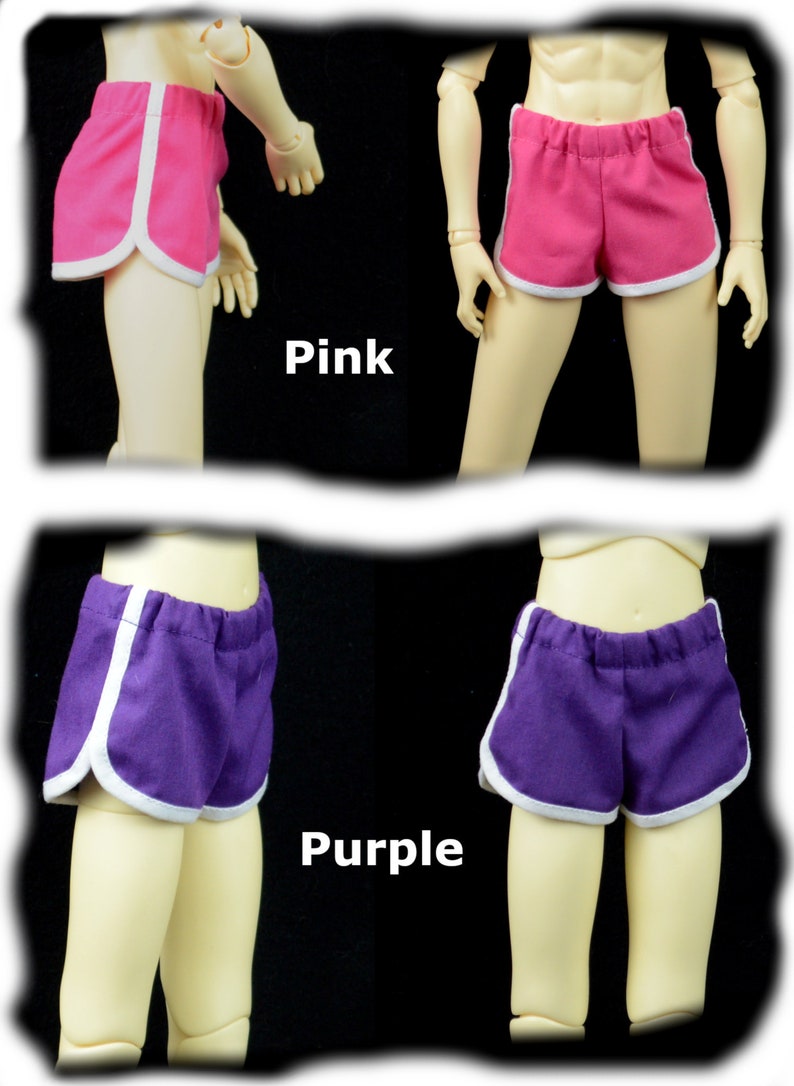 May include: Two pairs of athletic shorts with white piping. One pair is pink and the other is purple.