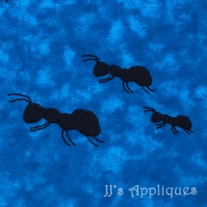 May include: Three black ant silhouettes on a blue background with a white text overlay that reads "JJ's Appliques".
