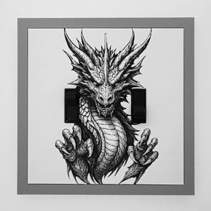 May include: A square light switch plate featuring a detailed black and white illustration of a dragon with sharp scales and claws. The design includes two black rocker switches positioned on either side of the dragon's neck, framed by a gray border.