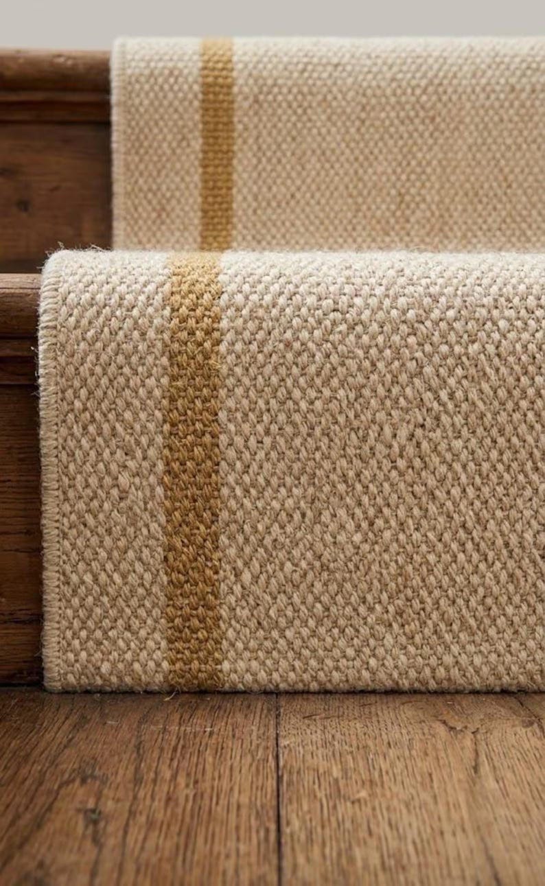 Macro focus on the zero-pile woven structure and natural wool yarn variations, offering a sophisticated earthy aesthetic that outshines a chaotic beni ourain rug hand knotted.