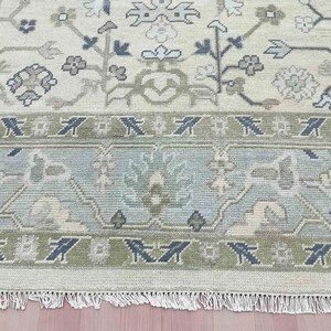 This beautiful 6x9 handmade rug placed perfectly under a modern dining table.