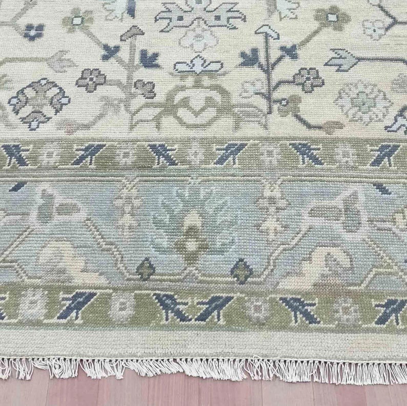This beautiful 6x9 handmade rug placed perfectly under a modern dining table.
