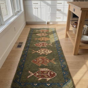 Angled shot showing the natural matte woolen finish and abrash effect, an elegant alternative to heavy tribal navajo rugs in a curated space.