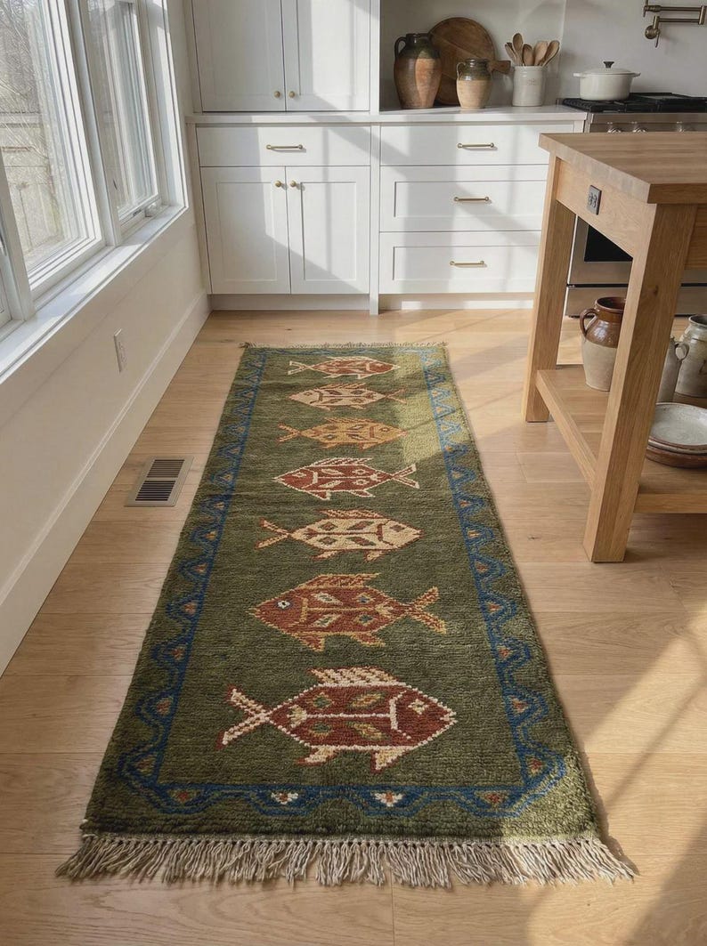 Angled shot showing the natural matte woolen finish and abrash effect, an elegant alternative to heavy tribal navajo rugs in a curated space.
