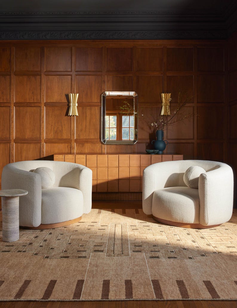 High-detail view showcasing the mocha and soft ivory geometric accents, displaying exquisite handcrafted rugs artistry that elevates luxury over typical novelty fun rugs.