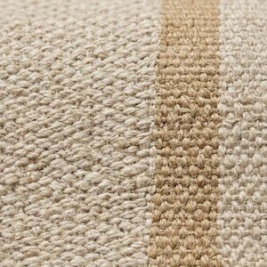 Ambient lifestyle shot showing the striped runner rug grounding a chic wooden hallway, acting as a serene and structured focal point unlike a busy scalloped rug or moroccan rug black and brown.