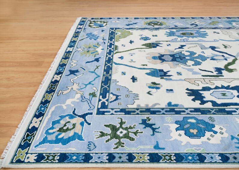 A shot focusing on the transition between the light blue field accents and the navy blue border motifs.