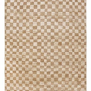 Detailed view of the alternating neutral cream and beige squares on the minimalist rug, emphasizing high-end handcrafted rugs symmetry.
