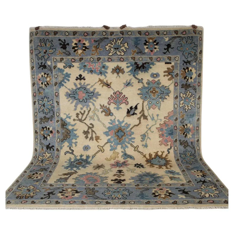 View of the back demonstrating the tight, hand-knotted weave and bound selvedges of this premium oriental rug.