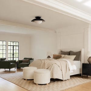 Sunlit modern living room setting styled with the checkerboard wool rug, highlighting its Scandinavian rug vibe and cozy organic warmth.