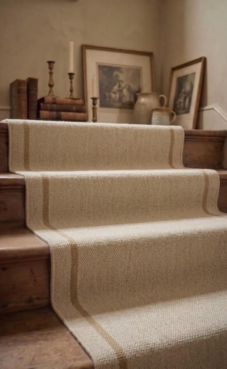 Detailed edge craftsmanship highlighting the tight tension of the light beige border stripe, an authentic Bhadohi artisan piece that easily outshines a generic nordic knots rug dupe.