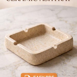 May include: Handmade clay ceramic ashtray. The square ashtray is a speckled beige color with four curved indentations for resting cigarettes. The image also includes text that says "Easy PDF" and "Beginner Friendly".