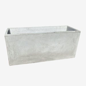 May include: A rectangular planter box made of light gray concrete with a smooth, matte finish. The container features clean, straight edges and a wide, open top, showcasing a solid, uniform construction with subtle variations in the gray tone.