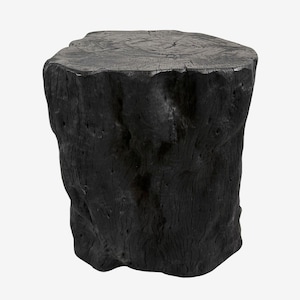 May include: A solid, black wooden stump with a flat, circular top and a rough, textured exterior. The stump is a natural, organic shape, with visible grain and imperfections. It could be used as a side table or decorative accent piece.
