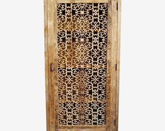 Carved Medallion Tall Cabinet