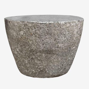 May include: A gray stone planter with a wide, flat top and a gently sloping, conical shape. The textured surface has a speckled appearance, with variations in gray tones. The planter is suitable for outdoor or indoor use.