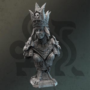 May include: A gray, stone-textured bust sculpture of a figure wearing an elaborate headdress with leaf-like spikes and a central face carving. The figure features cracked skin textures, ornate shoulder armor, and a base with geometric patterns.