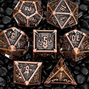 May include: A set of seven copper-colored polyhedral dice with intricate designs. The dice include a d4, d6, d8, d10, d12, d20, and a percentile die. Each die features detailed numbering and decorative patterns, perfect for tabletop gaming.