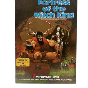 May include: A vintage computer game box cover for Fortress of the Witch King, a fantasy game of wizards and warriors. The cover features a colorful illustration of a horned, bearded man and a woman with long black hair, both sitting on a throne.