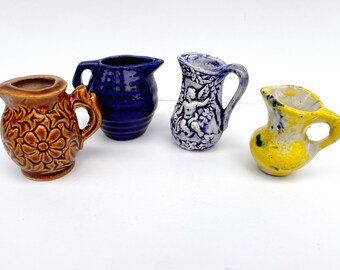 Four Vintage Miniature ceramic Pitchers