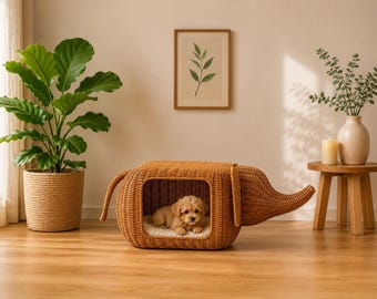 Cama minimalista de mimbre con forma de elefante para perros pequeños y gatos de interior con cojín suave.