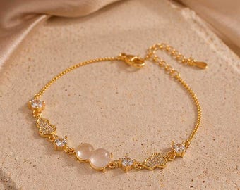 Gourd-shaped cat's eye stone bracelet ， Exquisite gold and silver zircon bracelet ， Lucky charm jewelry ， Everyday versatile bracelet