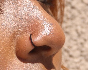Dark spot shop around nose piercing