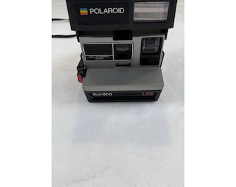 Aparat Polaroid Sun 600 LMS z paskiem, nietestowany
