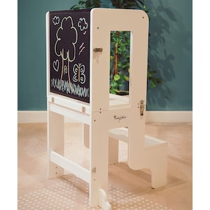 May include: A rustic wooden sign with the text "Welcome to our home" in white lettering. The sign features a distressed finish and a simple, inviting design, perfect for entryway decor.