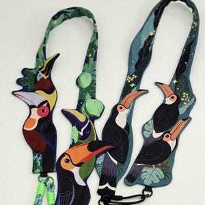 Correa portatarjetas con diseño de tucán de PIPIZU, accesorio para teléfono con forma de animal (parche para teléfono incluido)