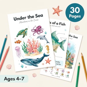 Può includere: Un set di tre libri di attività educative a tema oceanico. La copertina del primo libro recita "Under the Sea Adventures in the Ocean". I libri presentano illustrazioni di creature marine e il testo "30 Pagine" e "Età 4-7".