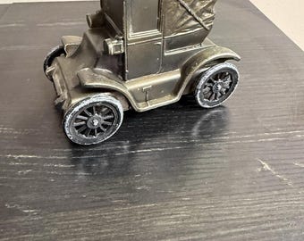 Vintage myntbank för antik bil från 1900